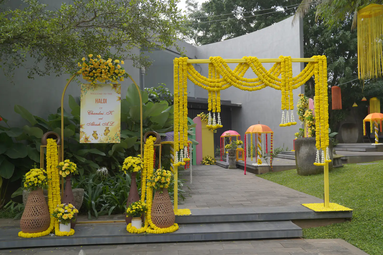 Haldi archway in yellow and orange