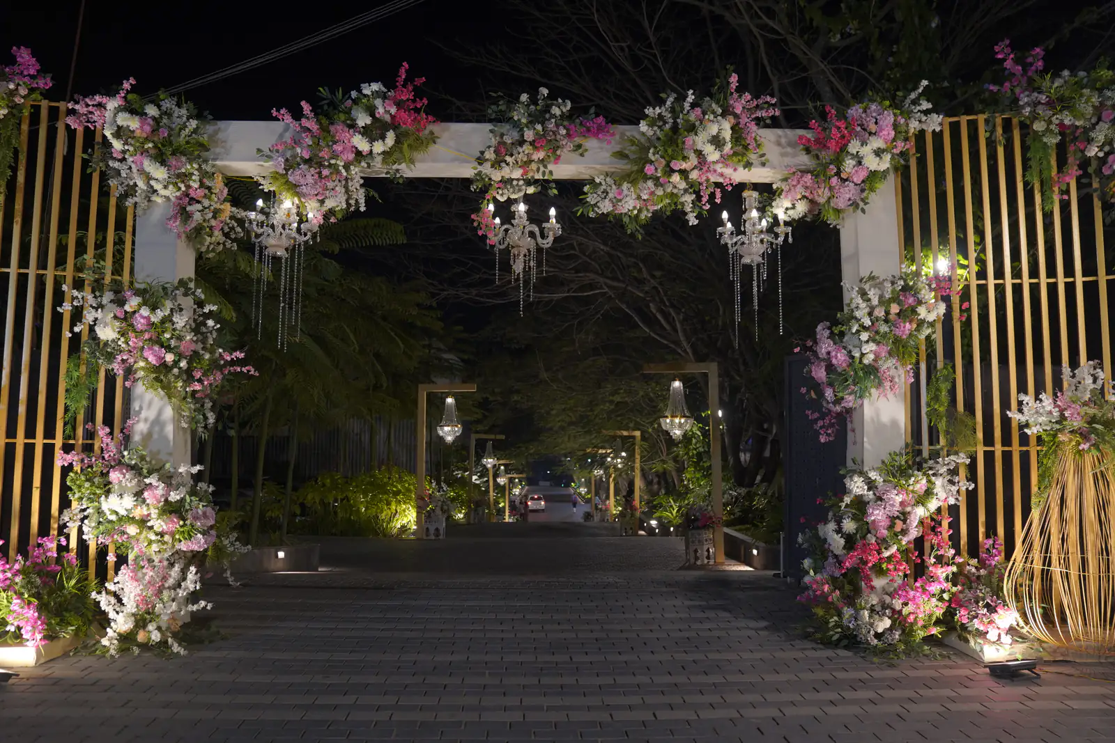 Floral entrance lit at night